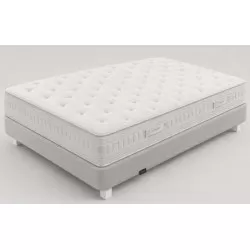 Colchón Sonpura Tarraco V6 135x190 tapizado en tejido blanco y acabados en gris, con diseño ergonómico y acolchado superior.