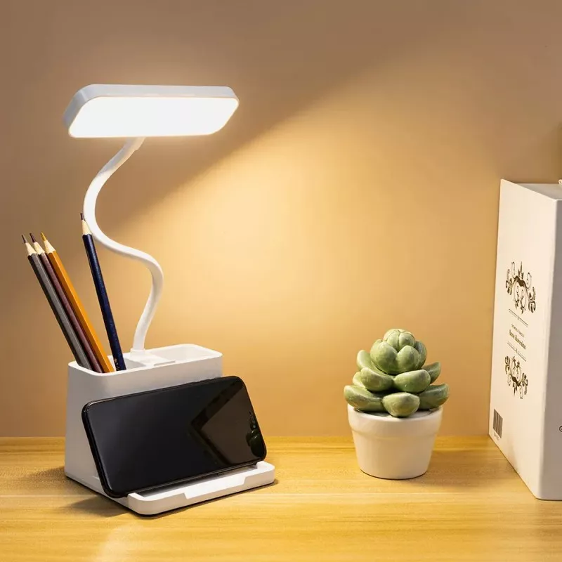 Flexo LED Fabrilamp Genio 6 W blanco con portalápices, diseño moderno, brazo flexible y base funcional.