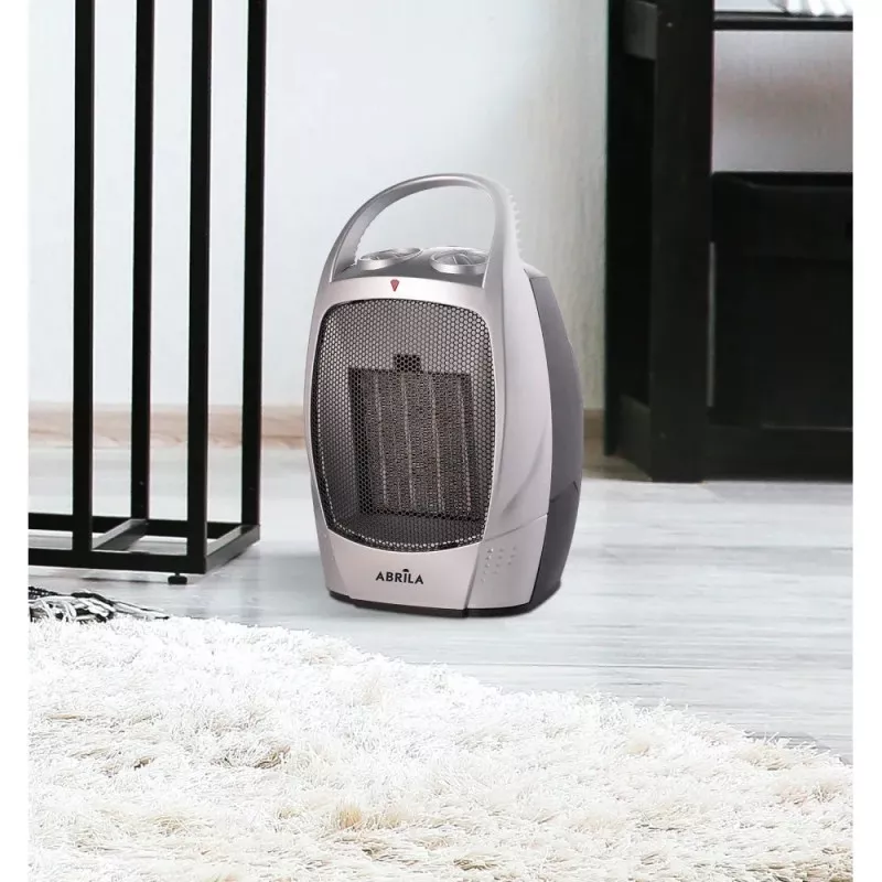 Calefactor cerámico Fabrilamp 198631578 1500 W compacto gris con diseño moderno y fácil de trasladar.