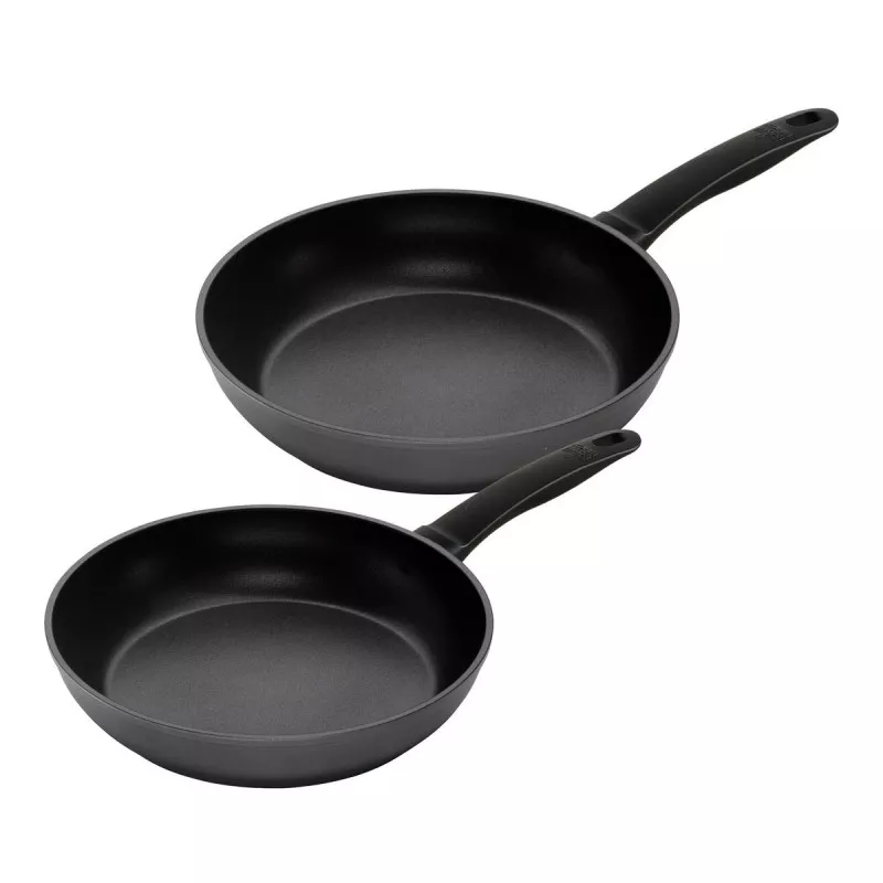 Juego sartén Easy Ind. 24-28 cm. Kuhn-Rikon de color negro antiadherente y diseño ergonómico para cocción eficiente.