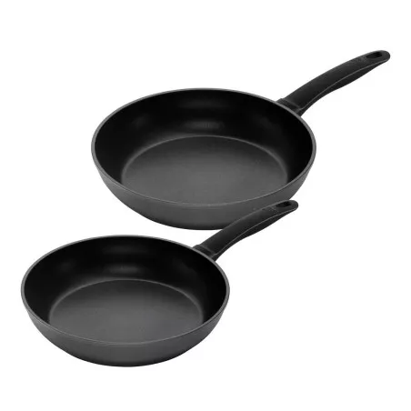 Juego sartén Easy Ind. 24-28 cm. Kuhn-Rikon de color negro antiadherente y diseño ergonómico para cocción eficiente.