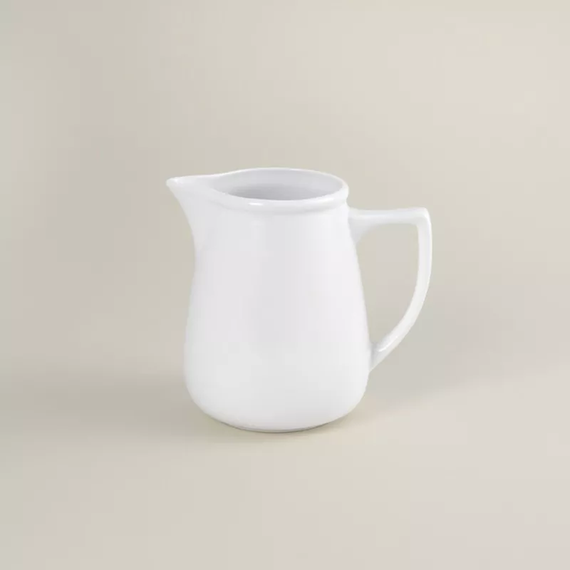 Lechera c/asa 920cc moderna Eurodra blanca de cerámica con diseño contemporáneo y acabado brillante.