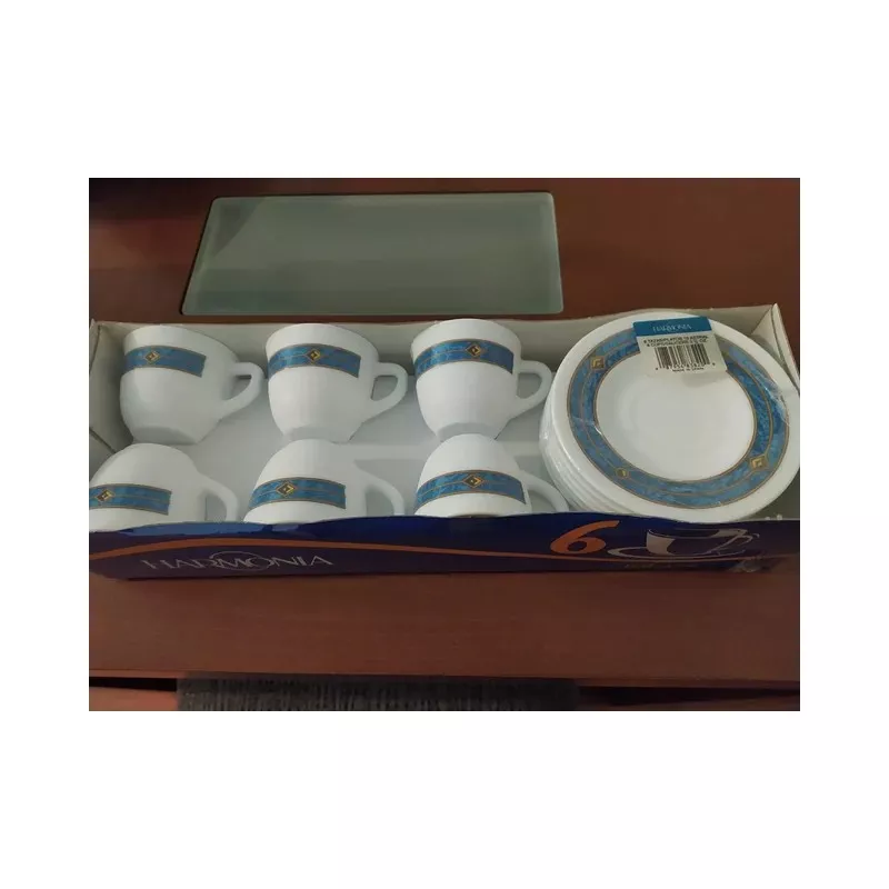Estuche Moka Harmonía Astral con 6 tazas de cerámica blanca y platillos decorados en azul y dorado