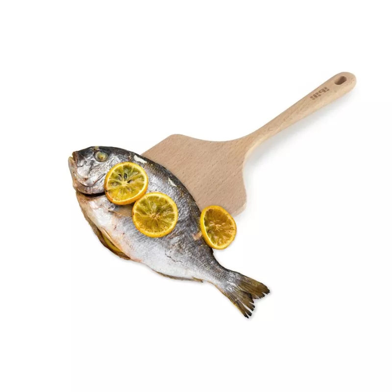 PALA PESCADO IBILI 683100 MADERA de color natural, diseño plano y mango ergonómico para servir pescados.