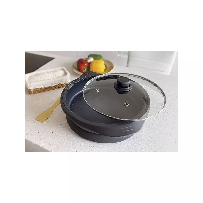 Cacerola eléctrica Jata PE640 34 cm 1600 W antiadherente color negro con tapa de vidrio y diseño moderno.