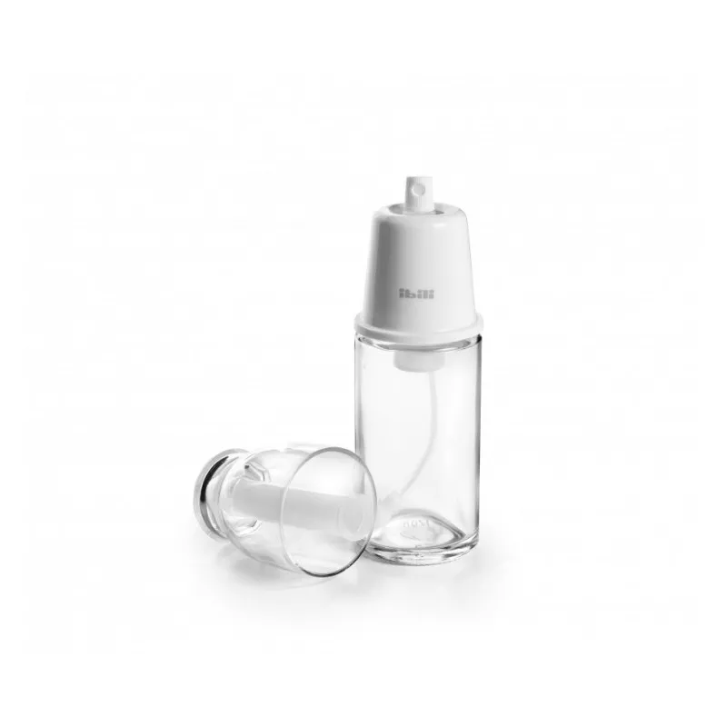 Aceitera pulverizador inox Ibili 701117 transparente con tapa blanca, diseño elegante y fácil uso para aceite y vinagre.