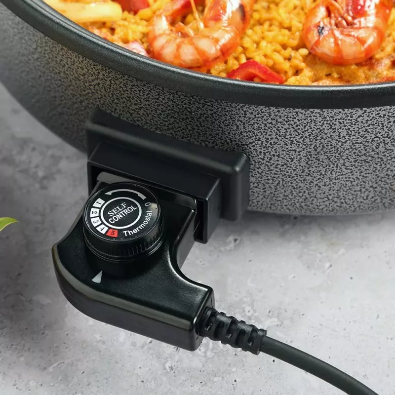 Sartén eléctrica Orbegozo PZ4270 42 cm 6,5L antiadherente con control de temperatura y diseño redondo en color negro.