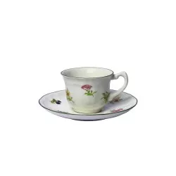 TAZA CAFE C/P FLORES C/FILO de cerámica blanca con diseño floral colorido y acabado brillante.
