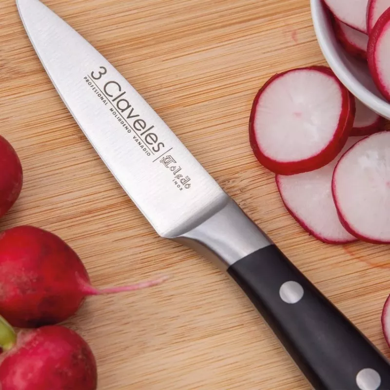 Cuchillo Toledo Verdura 9 cm 01530 de acero inoxidable con mango ergonómico negro y hoja afilada para cortes precisos.
