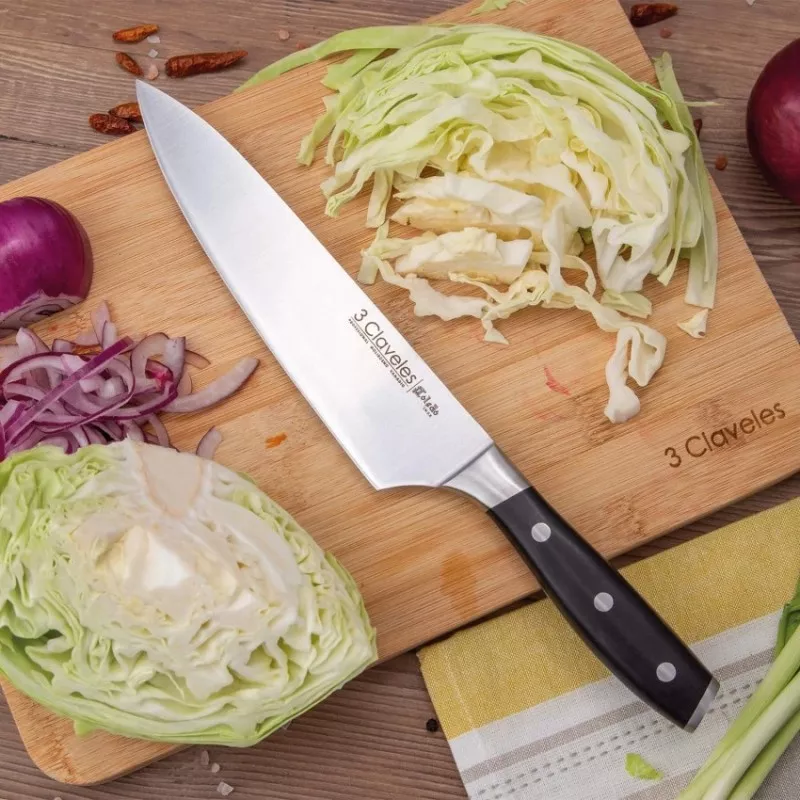 Cuchillo Toledo Cocinero 25 cm de acero inoxidable con mango negro y diseño ergonómico para un corte preciso