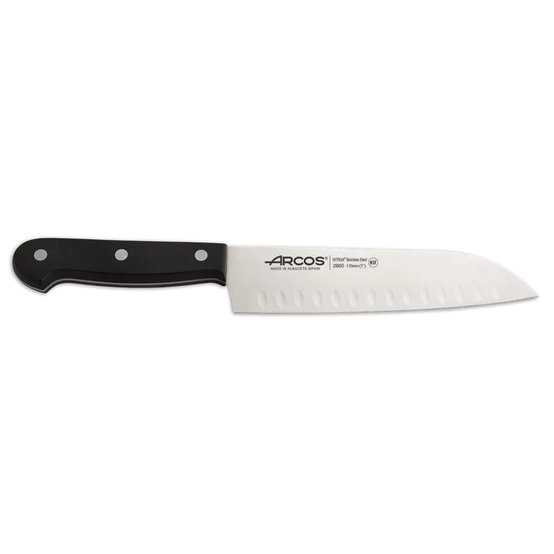 Cuchillo RFª 286004 ARCOS de acero inoxidable con mango negro y diseño de filo ondulado.
