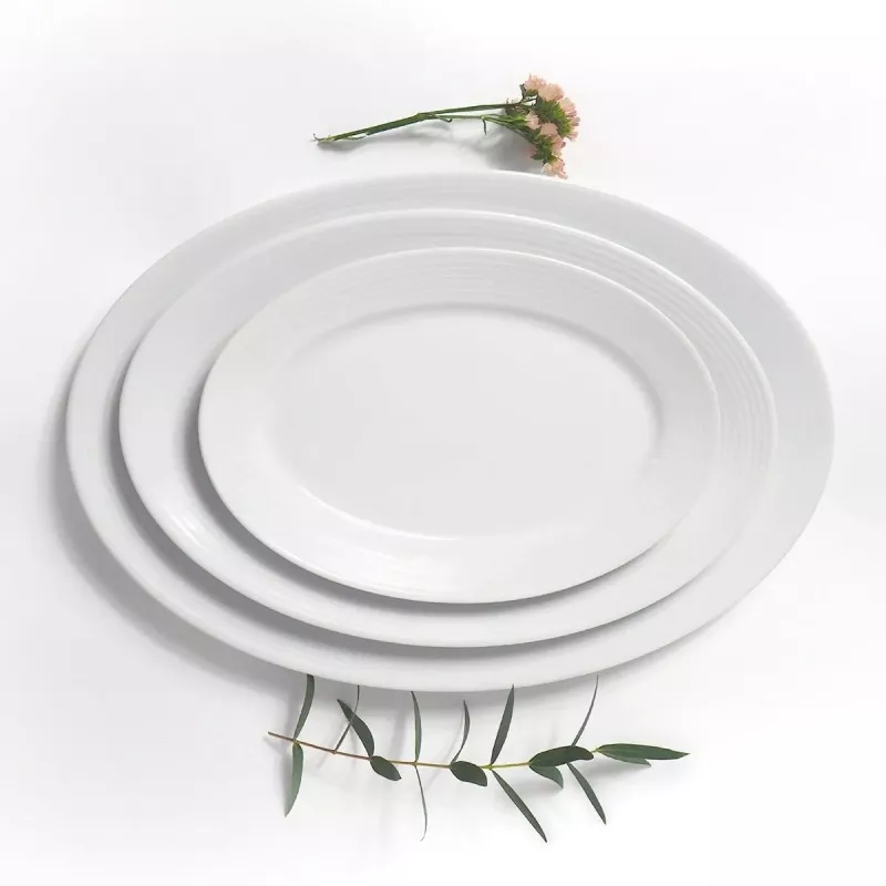Fuente oval 30 cm Iria blanca Dalper de cerámica, diseño elegante con acabado liso, ideal para servir.
