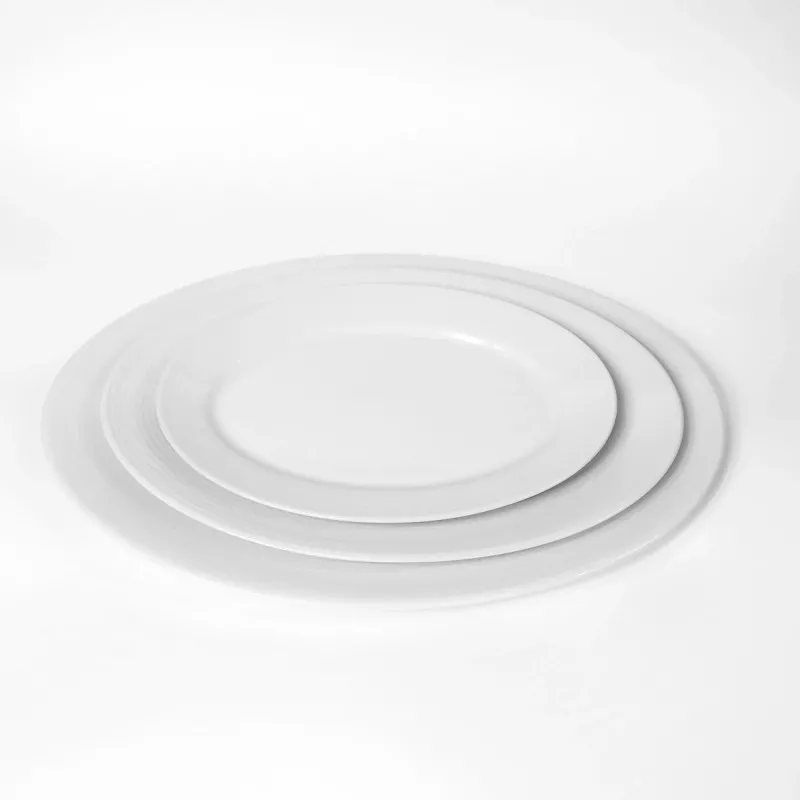 FUENTE OVAL 30 CM IRIA BCO DALPER porcelana blanca ovalada con acabado brillante y diseño elegante.