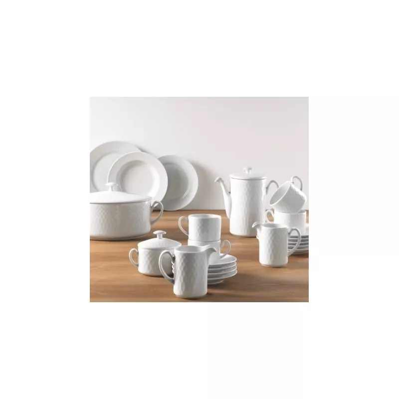 VAJILLA BALTICO BCO 57 P. 75881 ULTINOX de porcelana blanca con diseño moderno y acabado brillante, incluye platos y tazas.