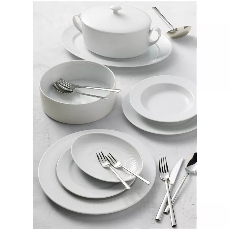 VAJILLA BALTICO BCO 57 P. 75881 ULTINOX de porcelana blanca con diseño elegante y acabado brillante, incluye platos y utensilios