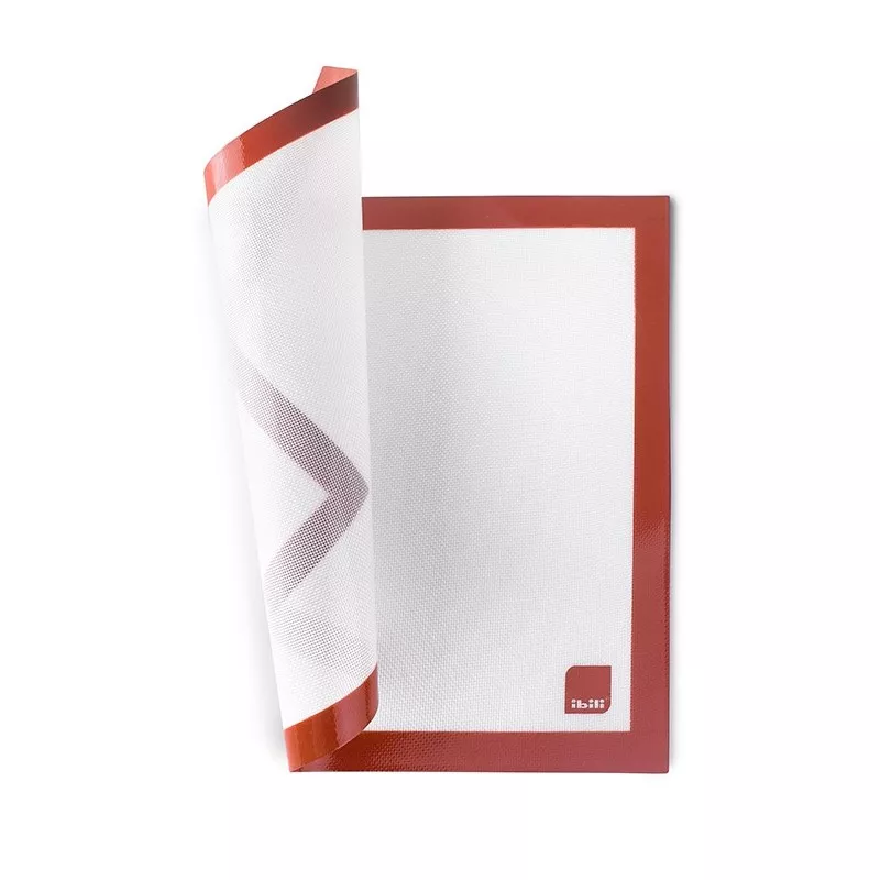 Tapete silicona Ibili 865000 Fiberglass 40 x 30 cm en color blanco con borde rojo y superficie antiadherente.