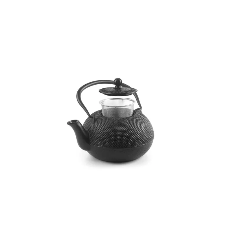Tetera hierro Ibili 0,70 negra con diseño texturizado, asa ergonómica y tapa de acero inoxidable.