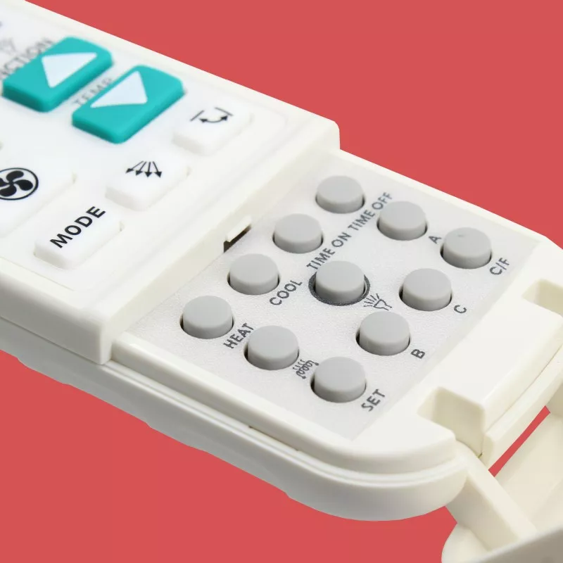 MANDO AIRE ACOND.TM ELECTRON TMUR C200 control remoto blanco con botones en relieve y diseño ergonómico
