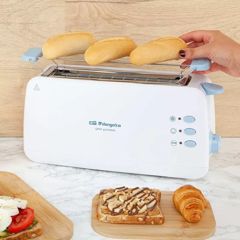 TOSTADOR ORBEGOZO TO 4012 BCO blanco con ranuras amplias y funciones de tostado para panes y bollería.