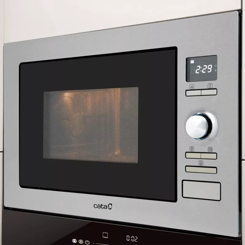 MICROONDAS CATA MC 25D de diseño moderno, acabado en acero inoxidable y control analógico, capacidad de 25 litros
