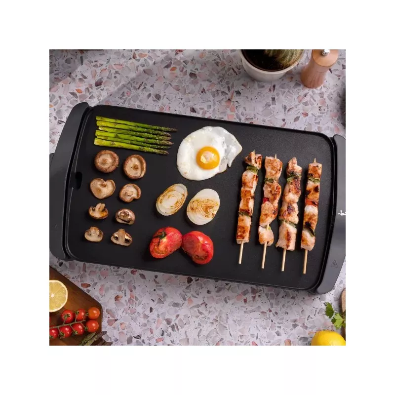 BARBACOA JATA GR555A 46*28 2.500W con superficie antiadherente negra y diseño compacto ideal para asar alimentos.
