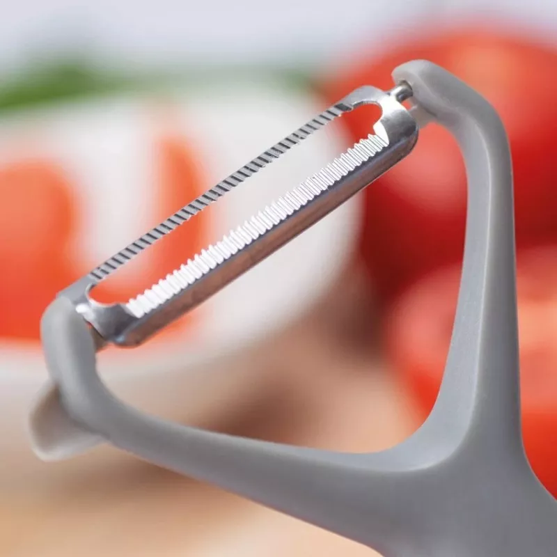 Pelador de tomate 3 Claveles 04648 dentado 16 cm en color gris, acero inoxidable y diseño ergonómico.