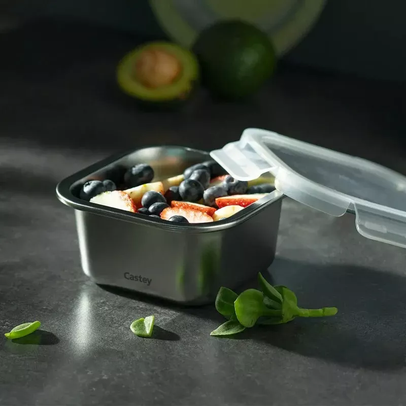 Tupper Castey C-C600 acero inoxidable 600 ml cuadrado con tapa transparente y diseño moderno ideal para alimentos.