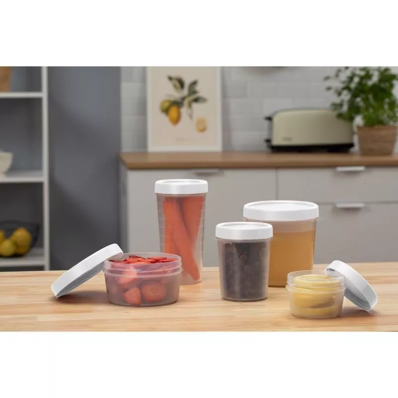 Tupper Tatay Twist 1160801 0,6 L blanco con tapa hermética y diseño apilable ideal para almacenamiento de alimentos.