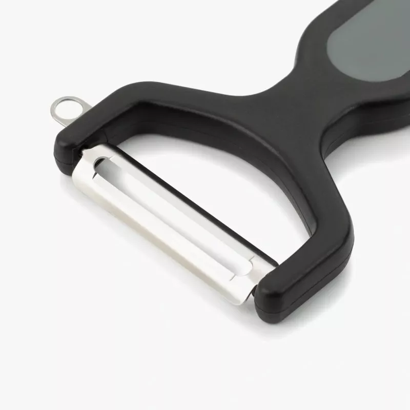 Pelador de cocina Arcos 607300 negro 132 mm de acero inoxidable con mango antideslizante y diseño ergonómico.